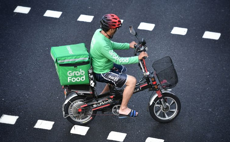 Make helmets and bright reflective attire a must for food delivery riders
