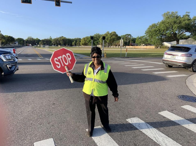 Crossing guard ignores signs to stop