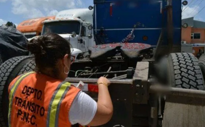 Traffic Authorities place reflectors on trucks to avoid accidents at night and rain